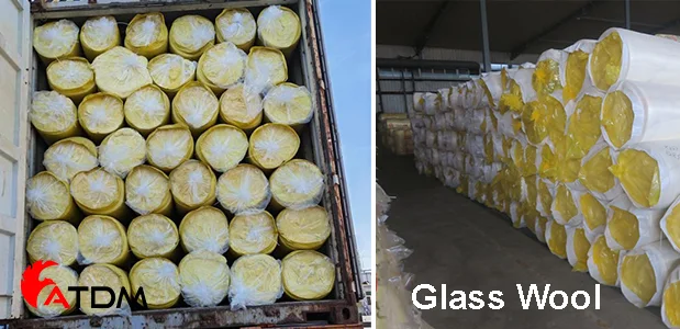 Stacks of yellow glass wool insulation rolls at a warehouse of a glass wool supplier