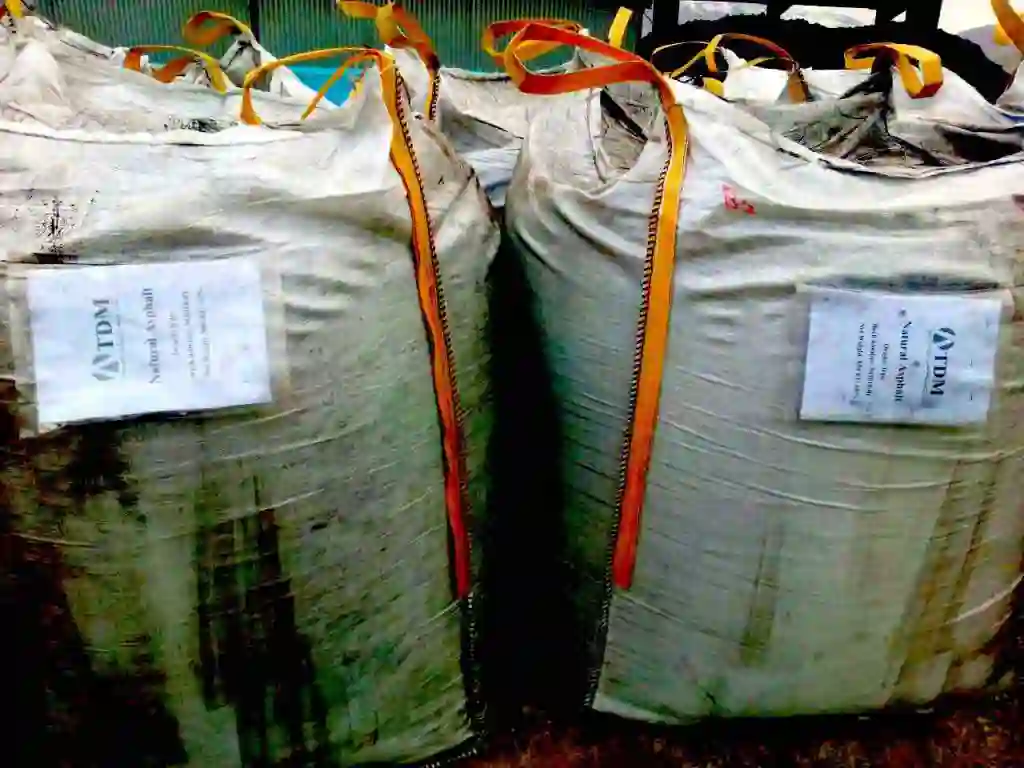 ATDM Natural Asphalt (Gilsonite) jumbo bags with lifting straps prepared for export.