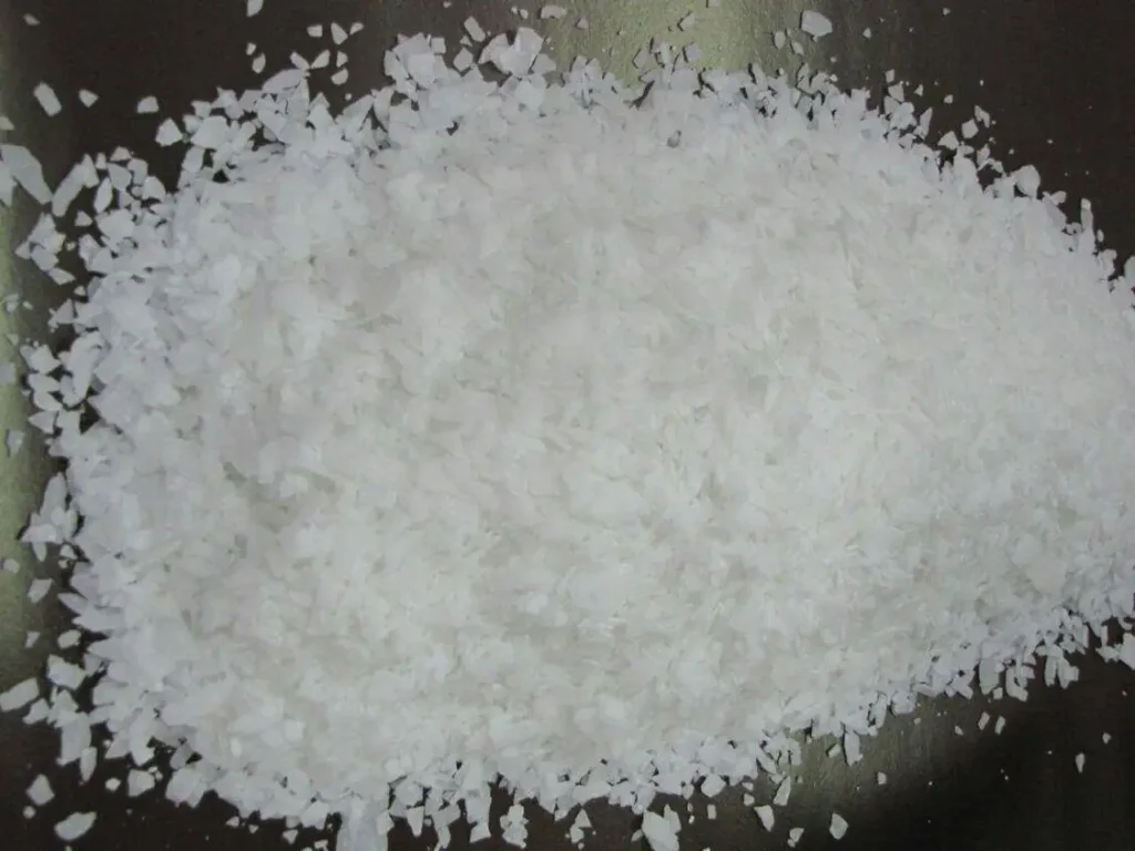 High-purity Caustic Soda Flakes (Sodium Hydroxide) used in detergent, paper, and chemical manufacturing industries.