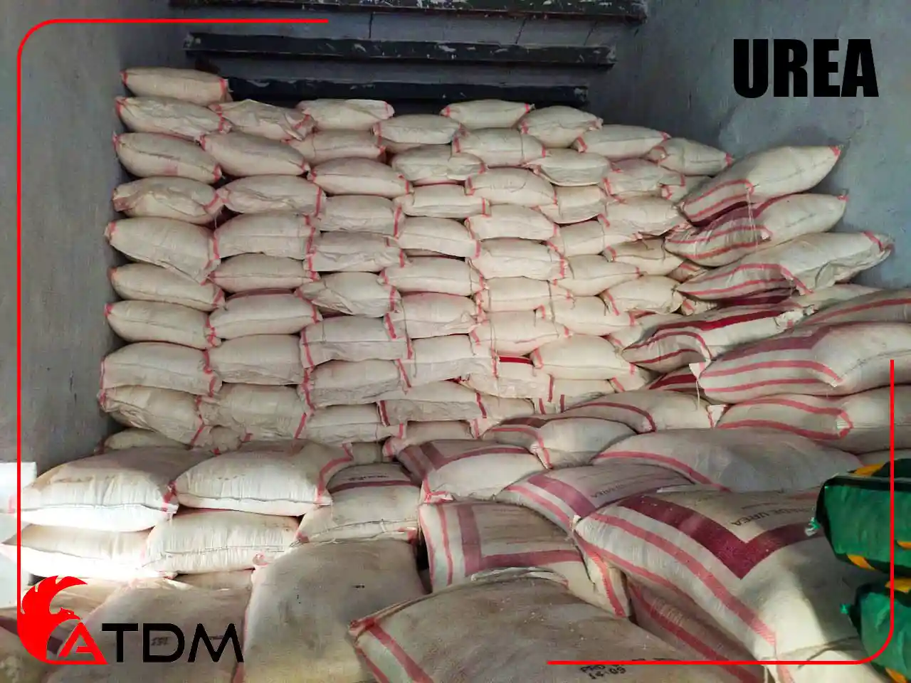 Industrial urea fertilizer bags stacked for export — nitrogen-rich granules used in agriculture and chemical industries.